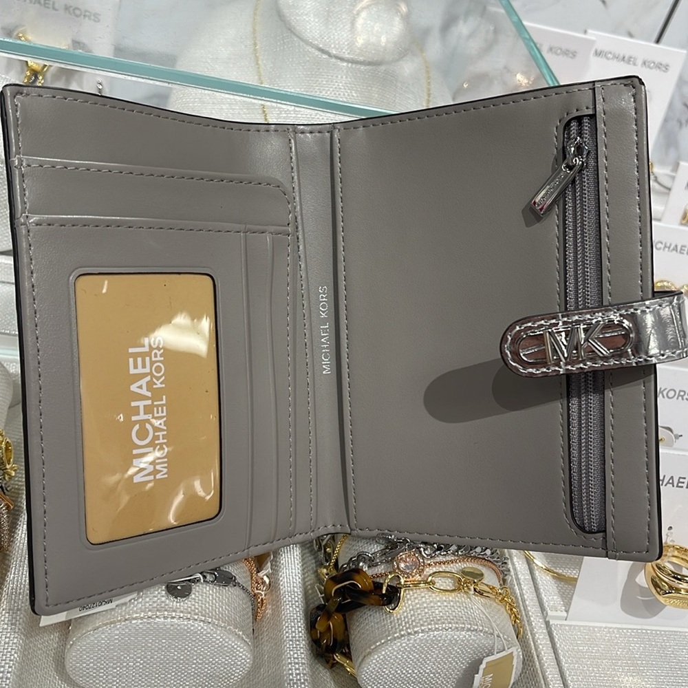 Michael Kors Empire Metallic Crocodile Embossed Leather Passport Wallet
Silver - Picture 9 of 16